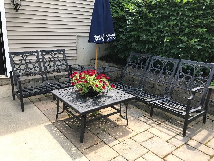 More heavy outdoor chairs and table