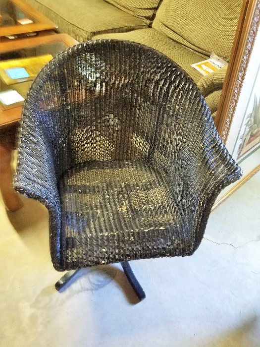 Black swivel wicker chair