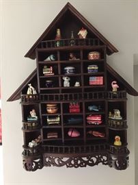 Beautiful carved display with trinket boxes.