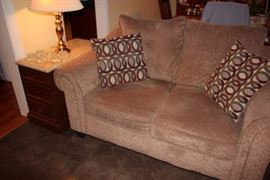 Side Table, Lamp, Bric-A-Brac, Love Seat with Accent Pillows