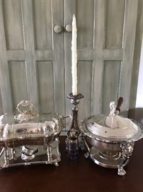  That piece in the back there, the tall candlestick? Unfortunately, we do only have one but it is solid silver!   Stunning! The other two items are silver plate.