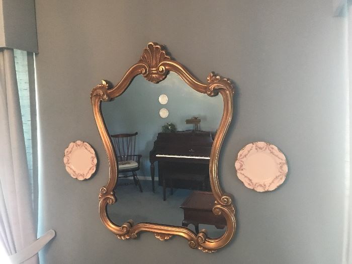 Ornate gold framed mirror