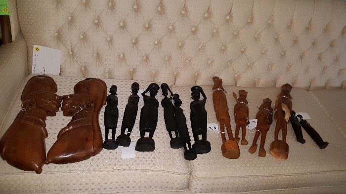 African  figures on French  Provencial Sofa 