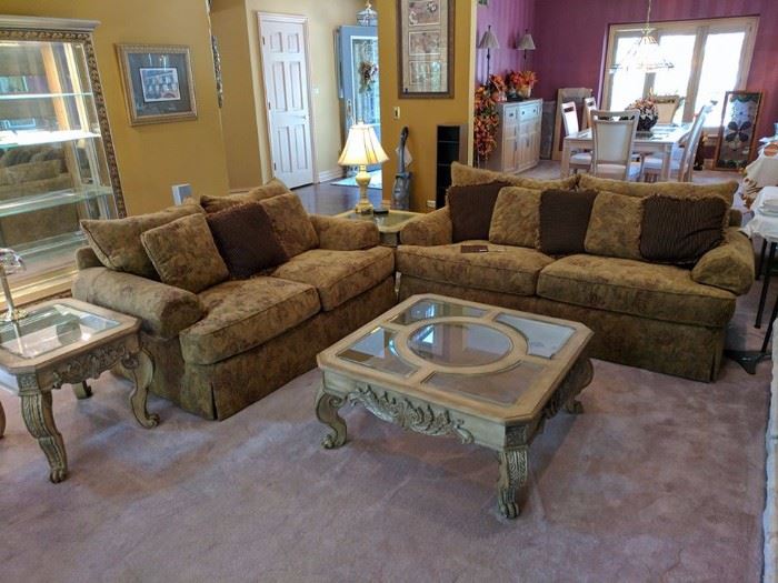 Gorgeous like new furniture in this stunning home.  These items are available for pre-sale.  Pricing is listed in description.  Pictured is the couch and loveseat of the Thomasville set, two end tables and the Pulaski Curio Cabinet with beveled glass.