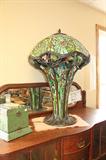 Contemporary Tiffany Floral Cobweb Table Lamp. This is made by Dale Tiffany, contemporary generation of the original Tiffany family. Item retails for more than $4500. Request more info.