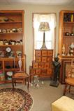 Apothecary style cabinet, vintage chandeliers and other light fixtures. Crystal, retro toleware, newer versions and ceiling fans.
