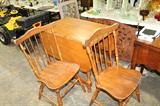 Example of solid vintage drop leaf table. Has three chairs - great project!