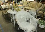 White vintage outdoor / patio wicker chairs and tables selection.