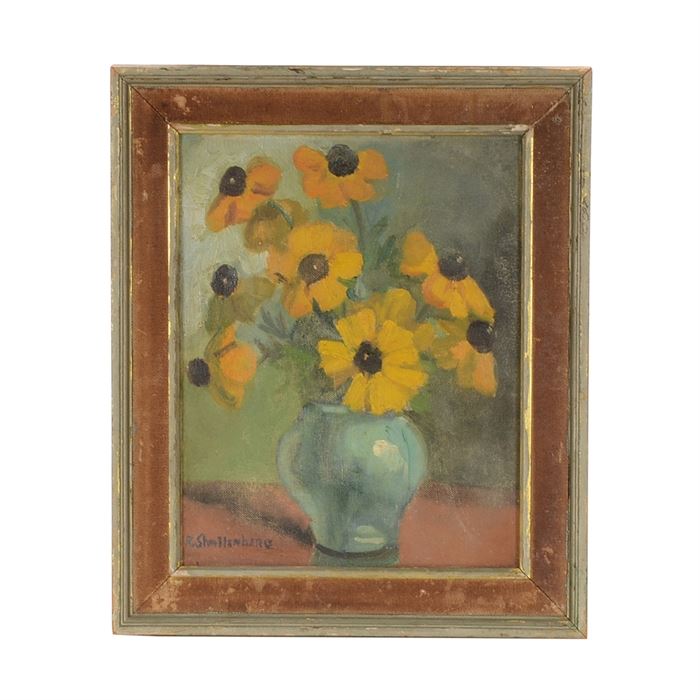 R. Shallenberg Original Floral Still Life Oil on Canvas Board: An original oil painting on canvas board signed in paint to the lower left by artist R. Shallenberg. The image depicts a floral still life with black-eyed Susans arranged in a bulbous light blue vase placed on a shiny table top against a neutral turquoise wall. This work is mounted behind a brown linen liner with a silver leaf fillet in a simple wood frame, equipped to hang.