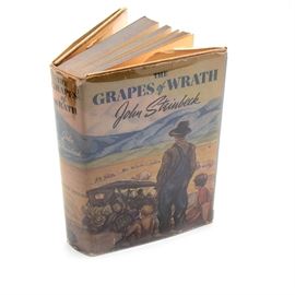 "The Grapes of Wrath" First Edition: A first edition, eleventh printing hardcover copy of John Steinbeck’s classic novel of the Great Depression The Grapes of Wrath. Published 1940 by the Viking Press of New York. It retains its original price-clipped dust jacket as well as a protective plastic sleeve.