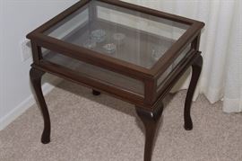 Glass topped mahogany display table