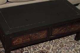 Nomwood table with ornate etching and glass top