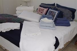 king bed with linens