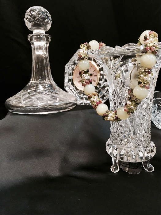 Waterford crystal clock, assorted crystal and glassware, jewelry. 