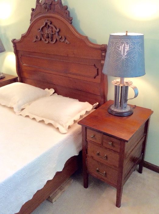 Antique walnut bed and side tables.