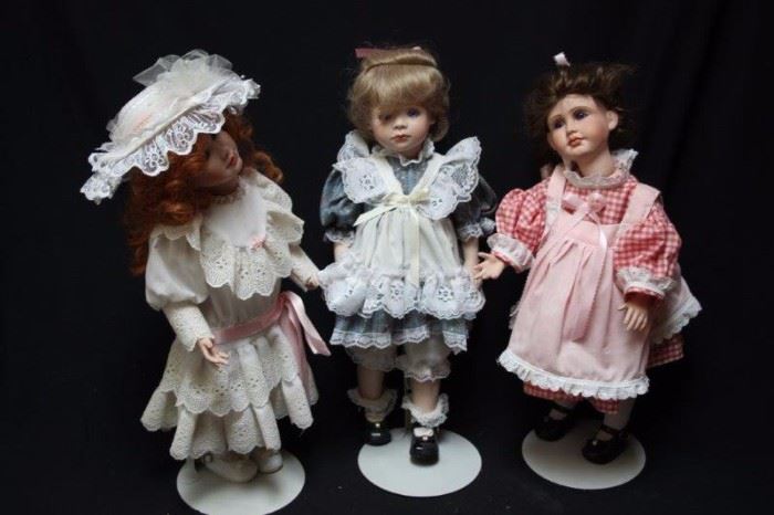 Three Hand-Crafted and painted Bisque Dolls