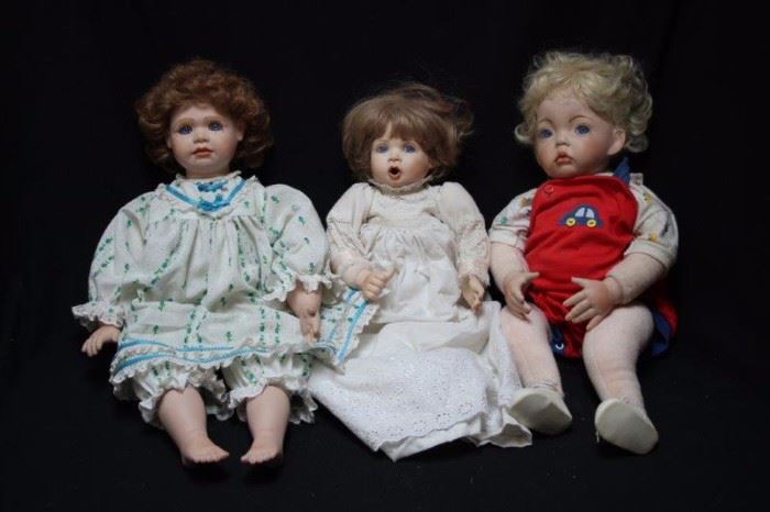 Three Bisque and Cloth Dolls