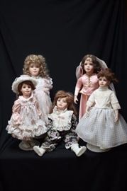 Five Hand Crafted and Painted Dolls