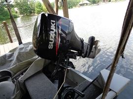 Alumacraft 15 Ft. fishing boat w/seats, 50 horse motor with approx. 25 hours use, trolling motor, fish finder, cover & trailer