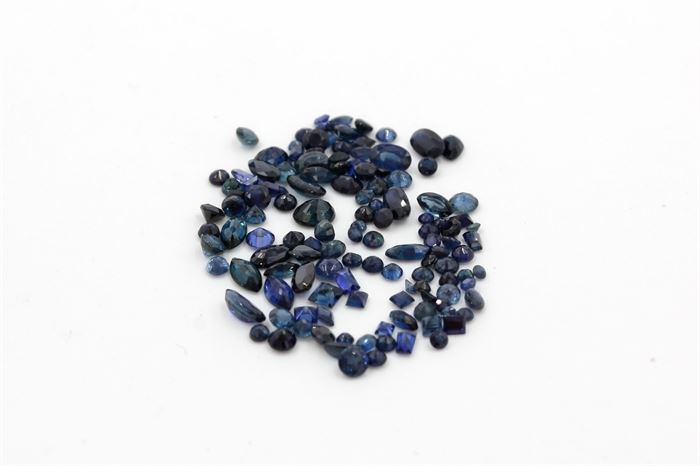 14.83 CTW of Sapphires: A collection of loose faceted blue sapphires in a variety of cuts and sizes.