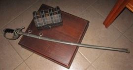 Dress academy sword plus an old treasure chest full of un searched jewelry