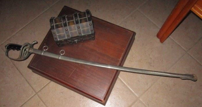 Dress academy sword plus an old treasure chest full of un searched jewelry