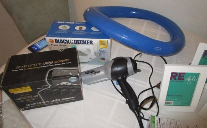 New unusued unopened items---curlers, blow dryer, iron, exercise ring