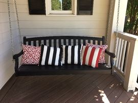 Great swinging bench and outdoor designer pillows!