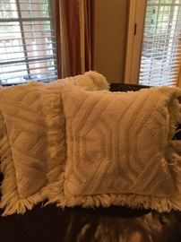 A nice assortment of designer pillows