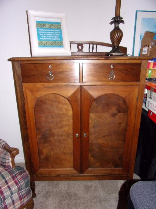 Antique dresser with enclosed drawers