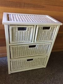 close up pof the four drawer wicker and wood chest asking $68 25.5"w x 15"d x 31.5"high