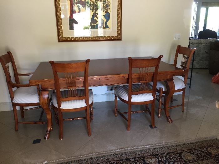 Italian dining table and 10 chairs - built in extension turn it into a flexible size depending on your gathering - 102" or 132".  without the leaves extended it is 72"l x 38"w x 30"h  asking 1800 or best offer perfect condition