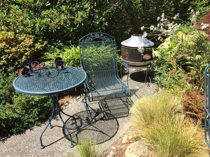 Outdoor iron furniture 26"inch diameter bistro table and two chairs asking $160 = chairs that go with table are shown with the larger outdoor table set.  This chair sold as a pair with one just like it.
