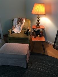 side chair, ottoman and table with brass lamp