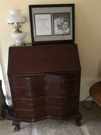 vintage secretary with milk glass lamp