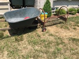 wheel barrel and wood storage rack