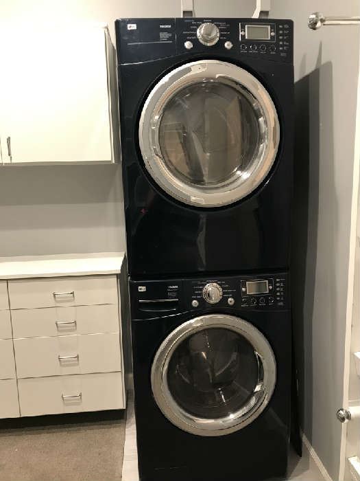 Navy Blue LG Tromm front loading steam washer and dryer (gas)
 W: 27"
 H: 39"
 D: 29.75" 