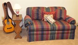 guitar, end table, love seat