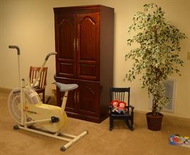 Exercise bike; TV cabinet; child's rocker