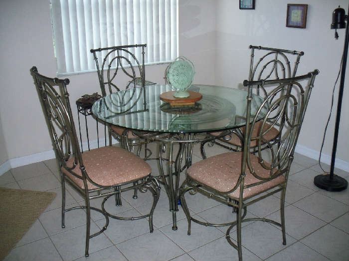 Glass top Metal base Dining table with 4 chairs