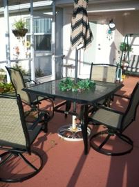 Patio Table with 4 chairs and umbrella