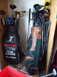 2 - Golf bags with clubs