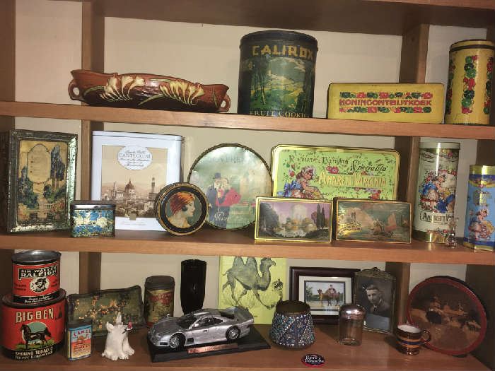 Tins and Roseville pottery