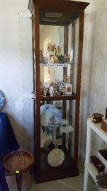 Display Case with misc figurines, plates