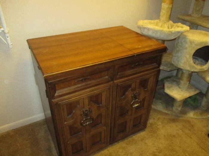 Seeing cabinet.  Less sewing machine 
