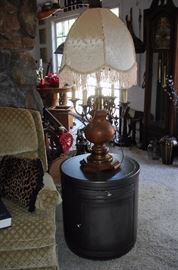 Victorian style lamp with shade on drum side table