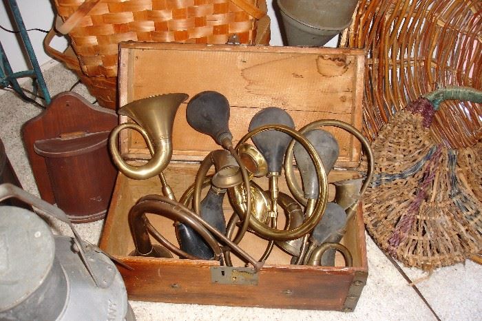 decorative bugles in small trunk together with baskets 