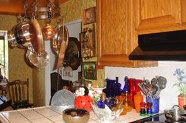 Kitchen - copper utensils lady bug cookie jay and colored glass pieces