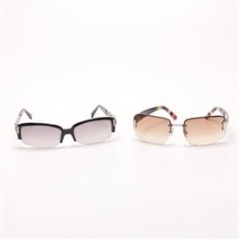 Kate Spade and Brighton Sunglasses: Two pairs of women’s sunglasses. Featured is a pair of Kate Spade Shay/S glasses with rimless lenses and multi-colored temples presented in a Kate Spade case. Also included is a pair of Brighton Tango sunglasses with decorative pierced metal temples.