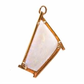 14K Yellow Gold Opal Pendant: A 14K yellow gold opal pendant. This pendant features a trapezoid opal stone prong set within a high polish trapezoid body.